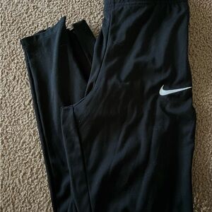 Nike Black with red/orange stripe Athletic Pants